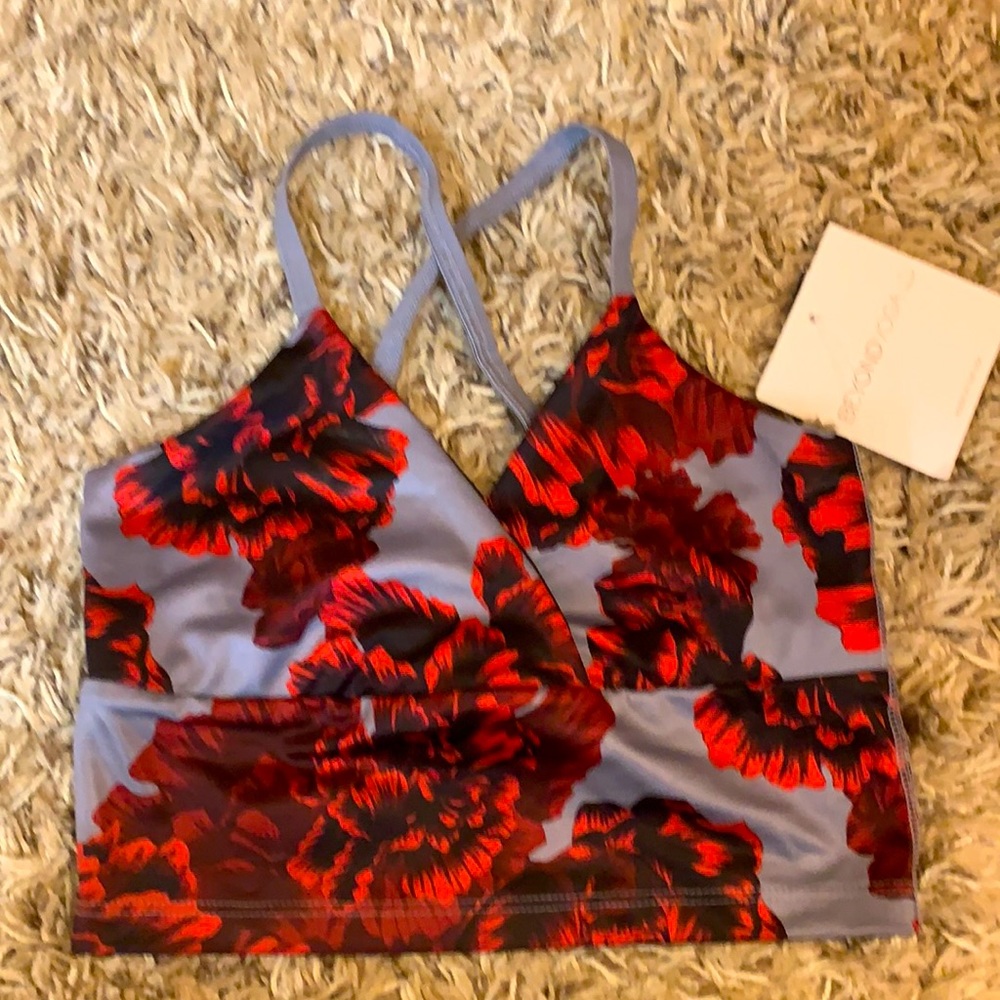 Beyond Yoga Lux Criss-Cross Cropped Yoga Tank in Peony Scarlet Sun